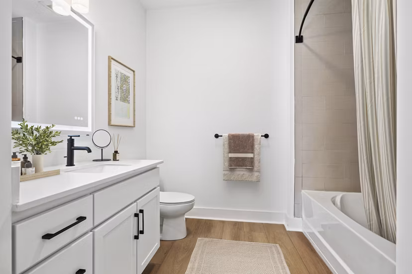 Modern bathroom with sleek fixtures at Atmark Apartments, offering luxurious features and contemporary design for a comfortable living experience