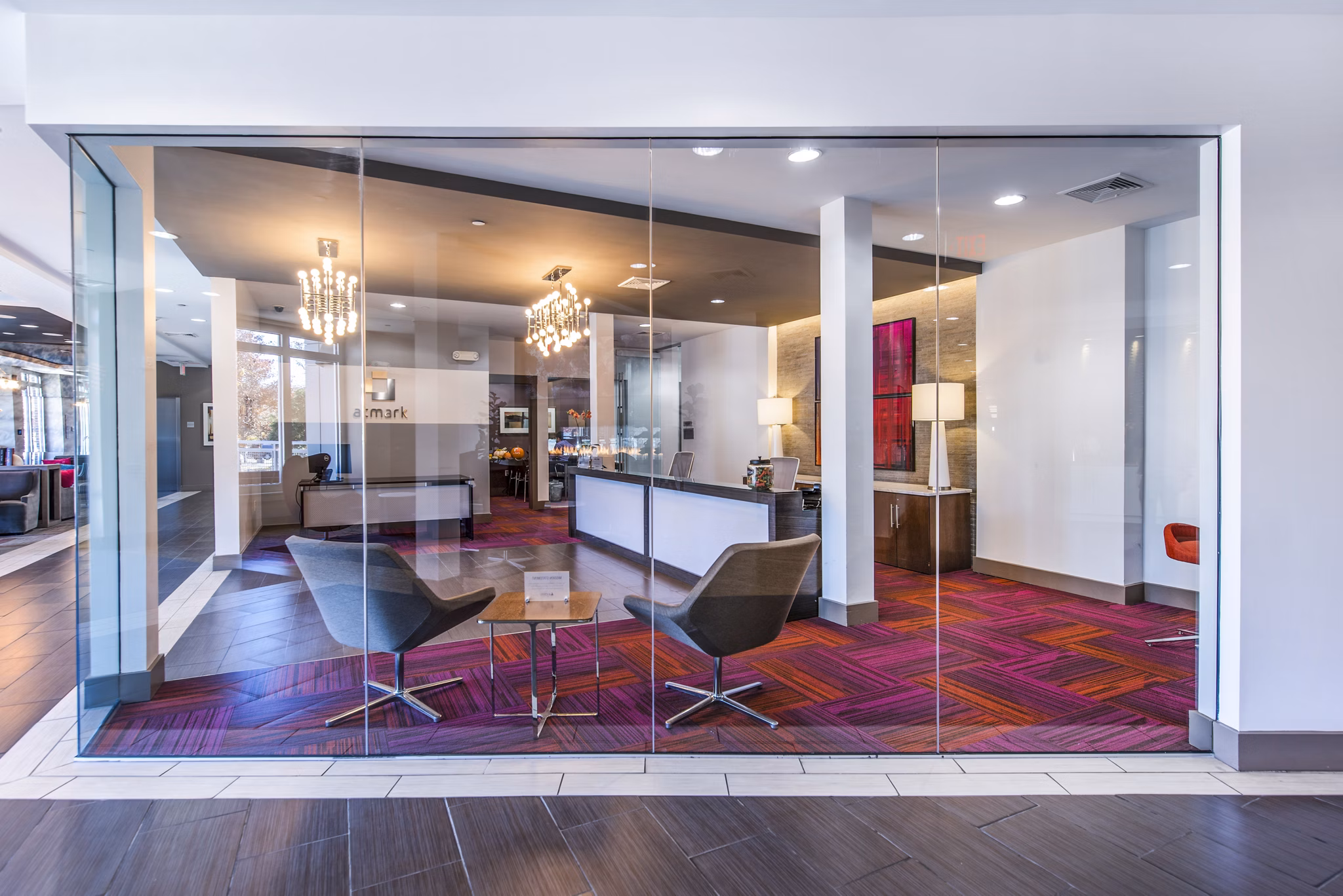 Spacious clubhouse/lobby with modern decor at Atmark Apartments in Cambridge