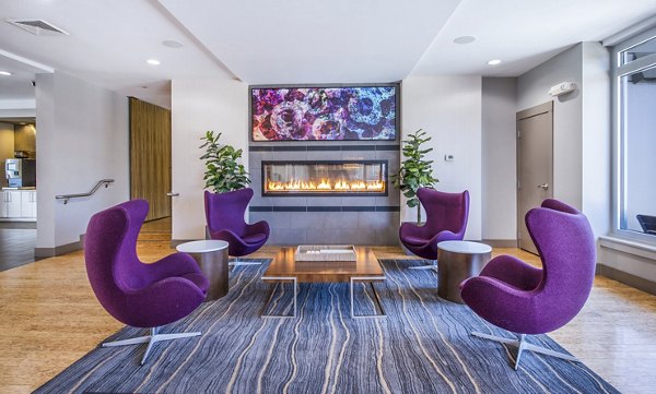 Elegant clubhouse lobby with modern decor at Atmark Apartments