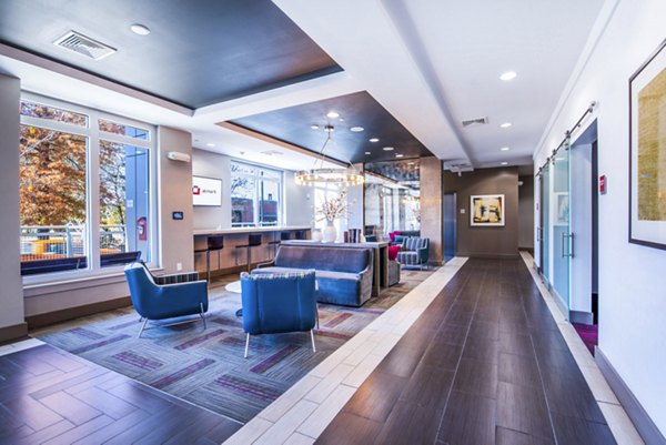 Elegant clubhouse lobby with contemporary seating at Atmark Apartments