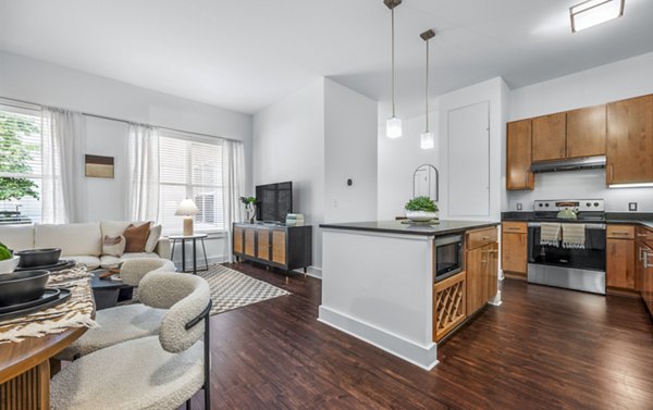 Modern kitchen with stainless steel appliances at Atmark Apartments, Greystar luxury property