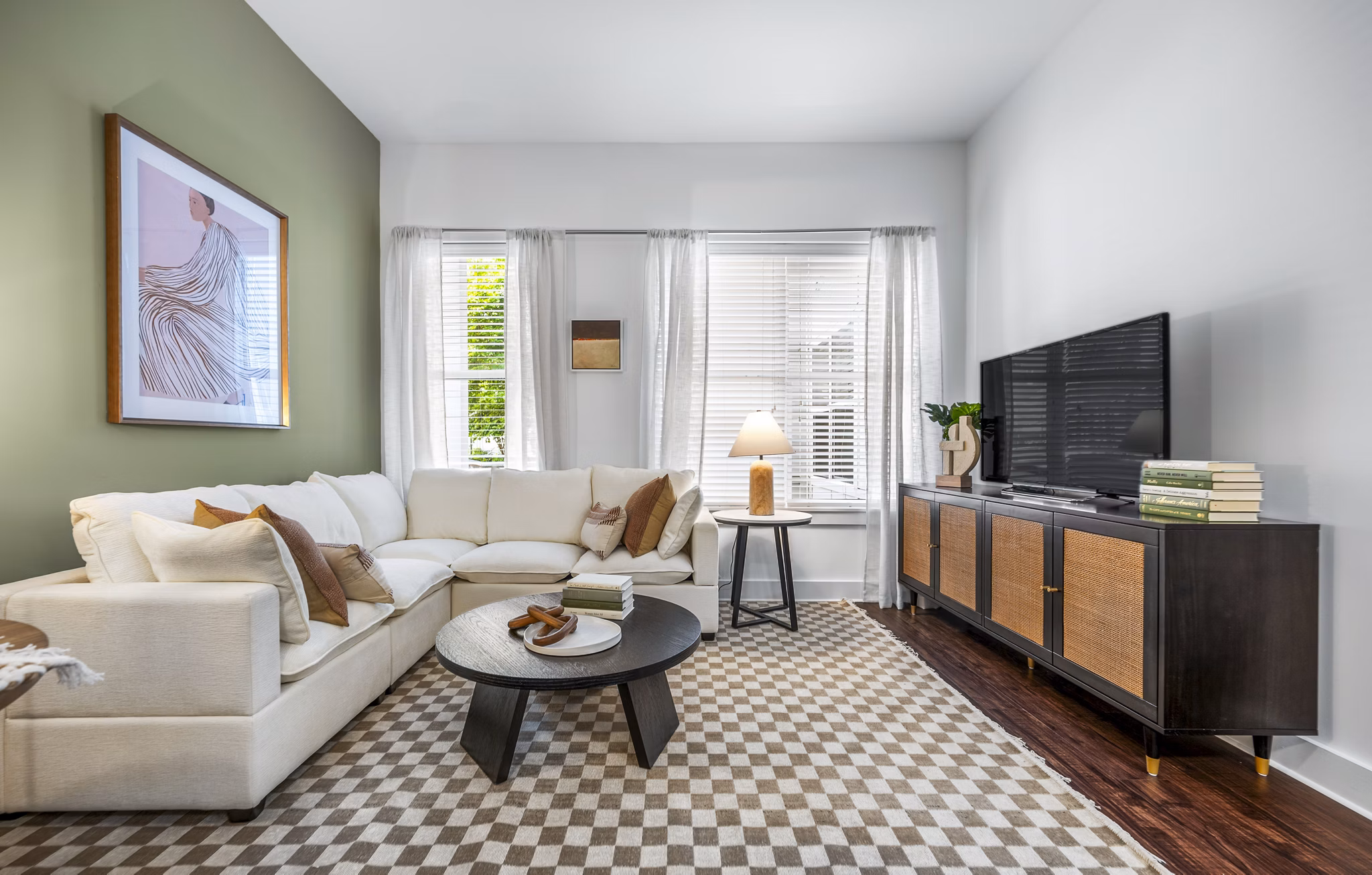 Modern living room with sleek furnishings at Atmark Apartments in Boston