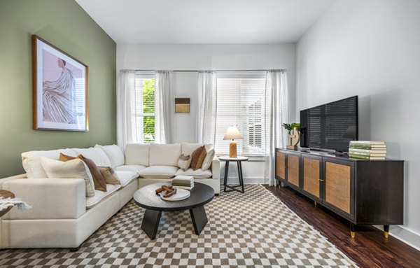 Modern living room with sleek furnishings at Atmark Apartments in Boston