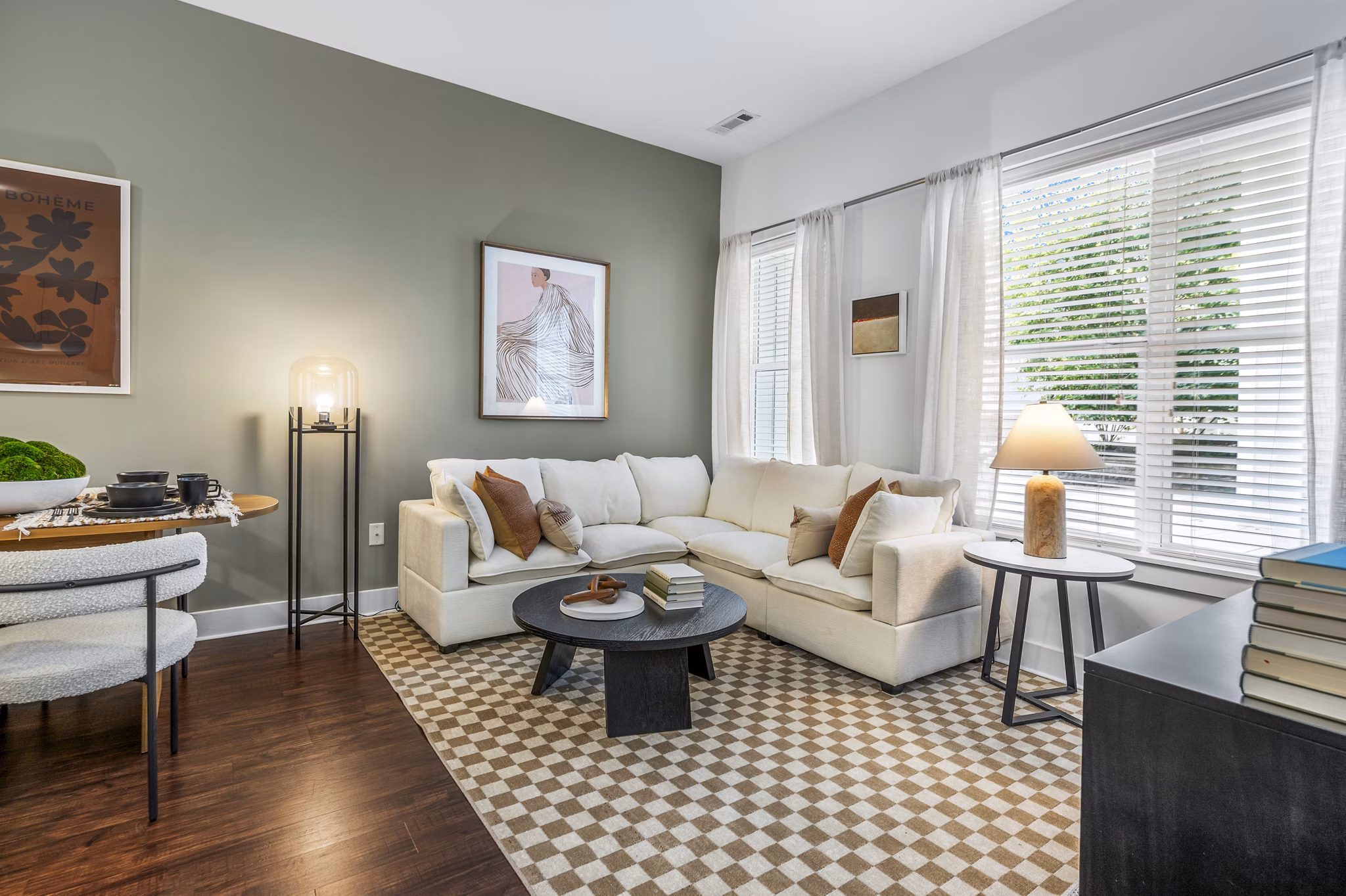 Living room with contemporary design and sleek furniture in Atmark Apartments