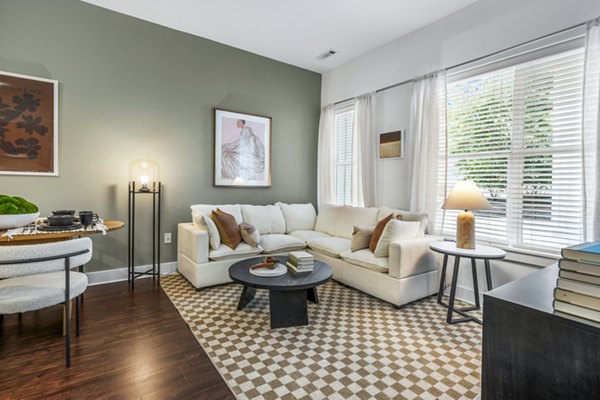 Living room with contemporary design and sleek furniture in Atmark Apartments