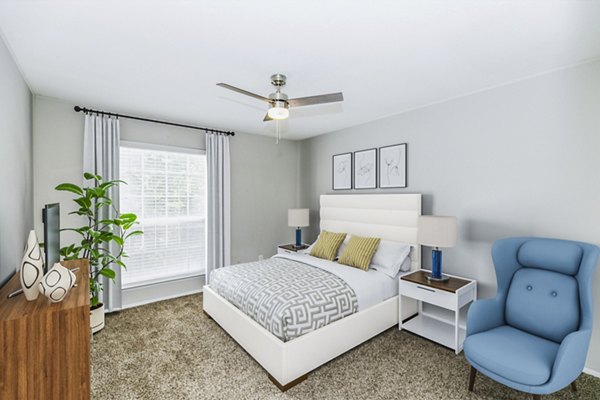 Spacious bedroom with large windows at Ridgemont at Stringers Ridge Apartments, offering luxury living and stunning views