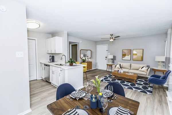 Dining room featuring modern decor and spacious seating at Ridgemont at Stringers Ridge Apartments