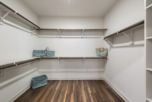 Spacious closet with built-in shelves in Prose Magnolia Apartments