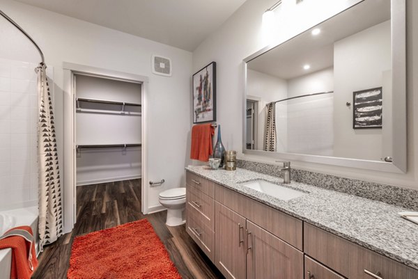 Luxurious bathroom featuring sleek vanity and modern fixtures at Prose Magnolia Apartments in Magnolia Springs Perfect blend of style and comfort