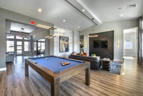 Clubhouse with elegant decor and modern furnishings at Prose Magnolia Apartments, luxury property by Greystar in an inviting community setting