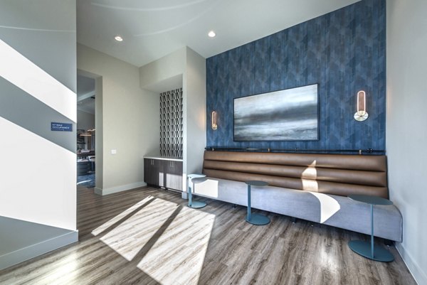 Clubhouse featuring modern design and comfortable seating at Prose Magnolia Apartments, luxury living experience by Greystar