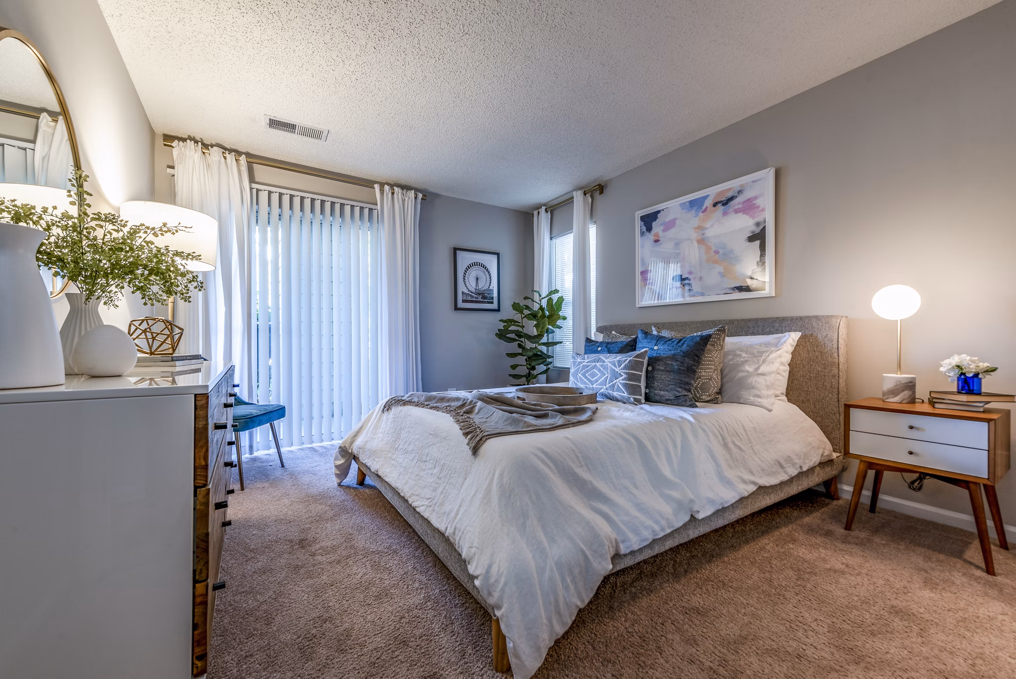 Avana Copper Springs: Elegant bedroom design with cozy neutral tones in modern luxury apartments