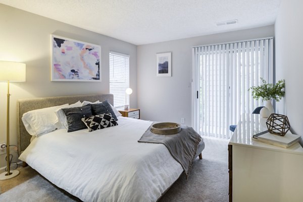 Cozy bedroom with modern decor at Avana Copper Spring Apartments
