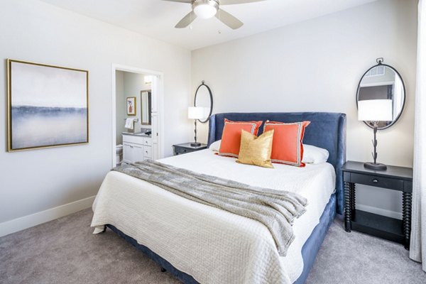 Cozy bedroom with modern decor at Album Indian Lake Apartments