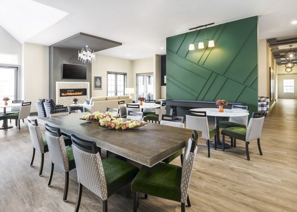 Stylish clubhouse with lounging areas at Album Indian Lake apartments