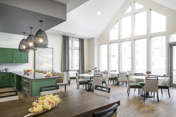 Clubhouse featuring modern design and social spaces at Album Indian Lake Apartments