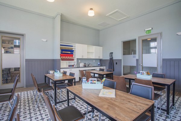 Clubhouse featuring modern design elements at Album Indian Lake Apartments, a luxury community by Greystar