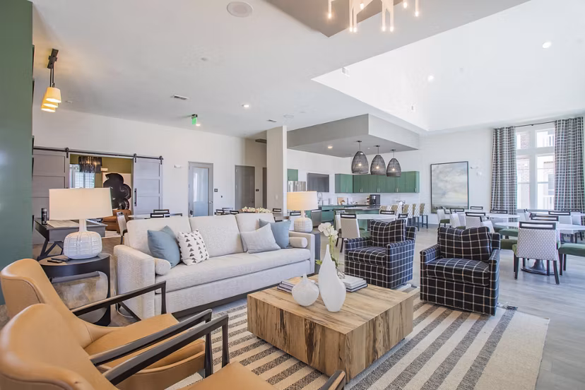 Modern clubhouse with elegant decor at Album Indian Lake Apartments, offering residents a stylish space for gatherings and events