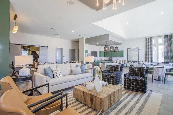 Modern clubhouse with elegant decor at Album Indian Lake Apartments, offering residents a stylish space for gatherings and events