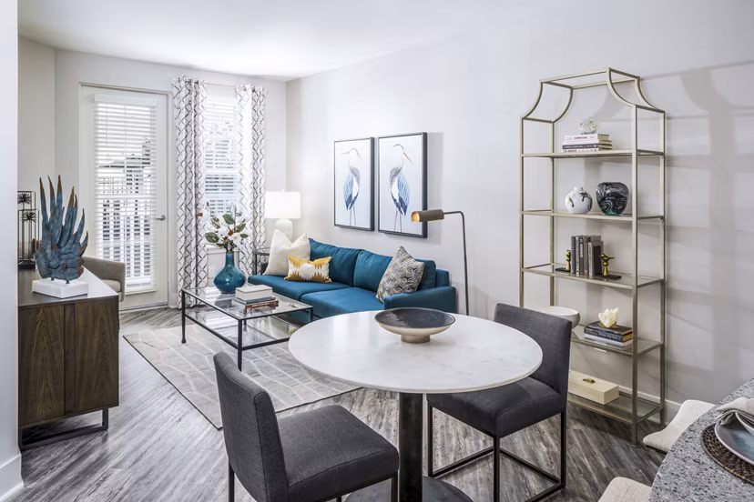 Spacious living room with modern furnishings at Album Indian Lake Apartments