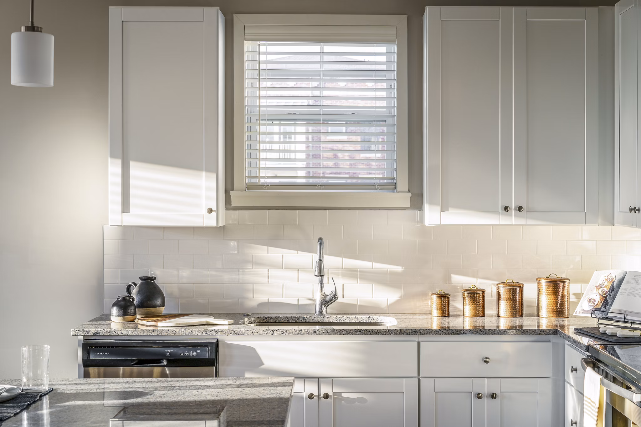 Modern kitchen with stainless steel appliances at Album Indian Lake Apartments