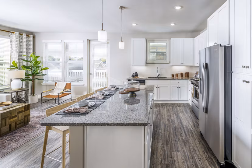 Modern kitchen with stainless steel appliances at Album Indian Lake Apartments