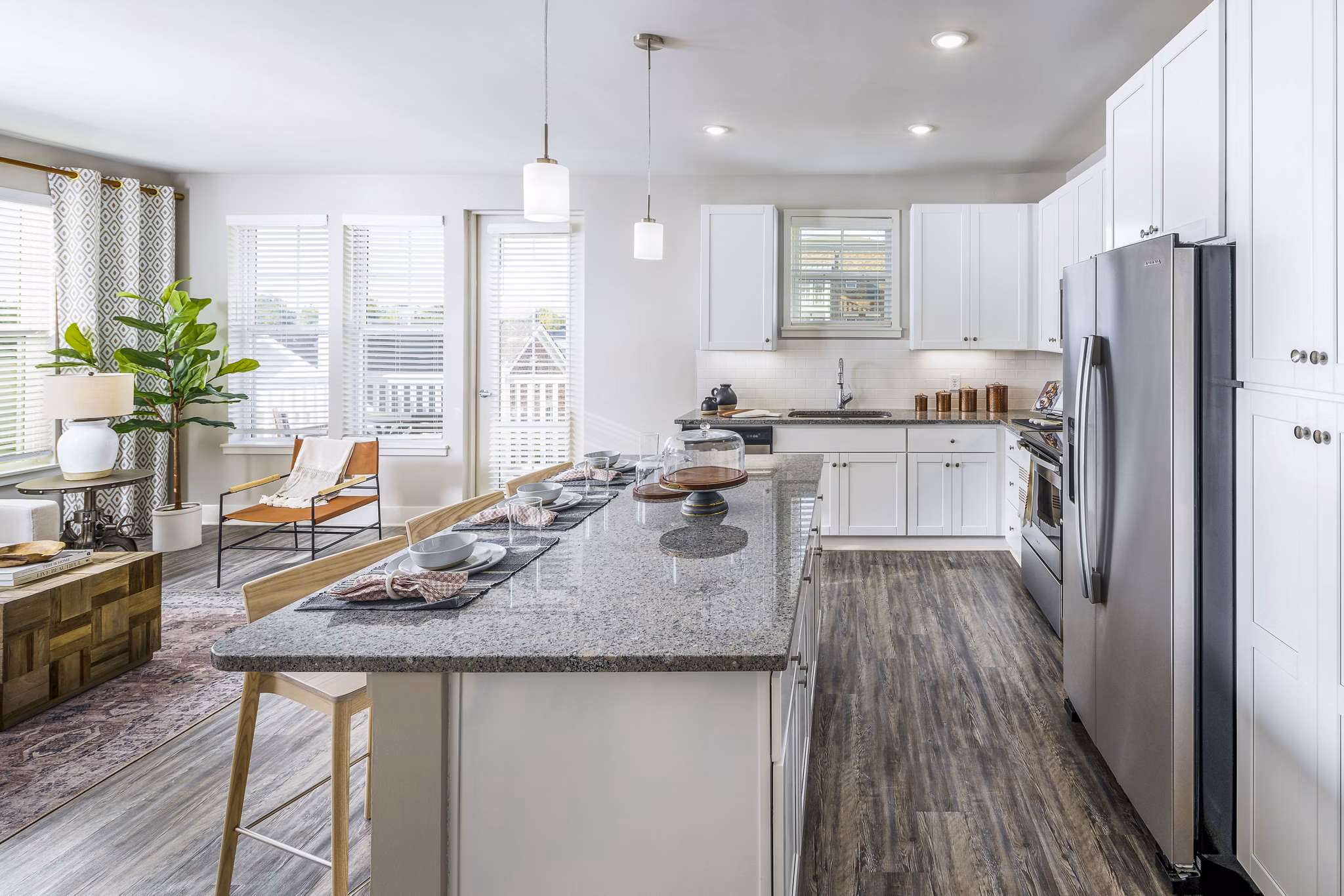 Modern kitchen with stainless steel appliances at Album Indian Lake Apartments