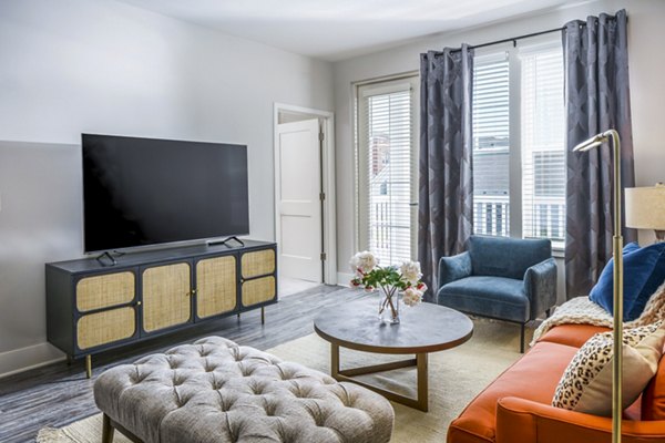 Modern living room with stylish decor at Album Indian Lake Apartments