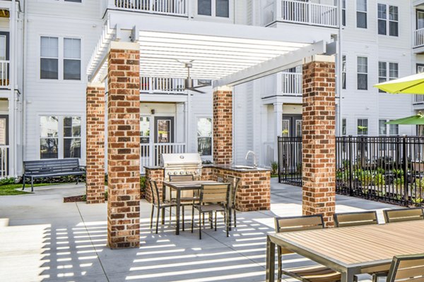 grill area/patio at Album Indian Lake Apartments