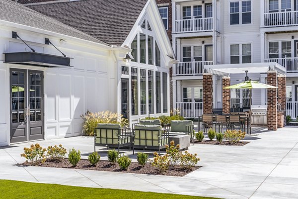 grill area/patio at Album Indian Lake Apartments