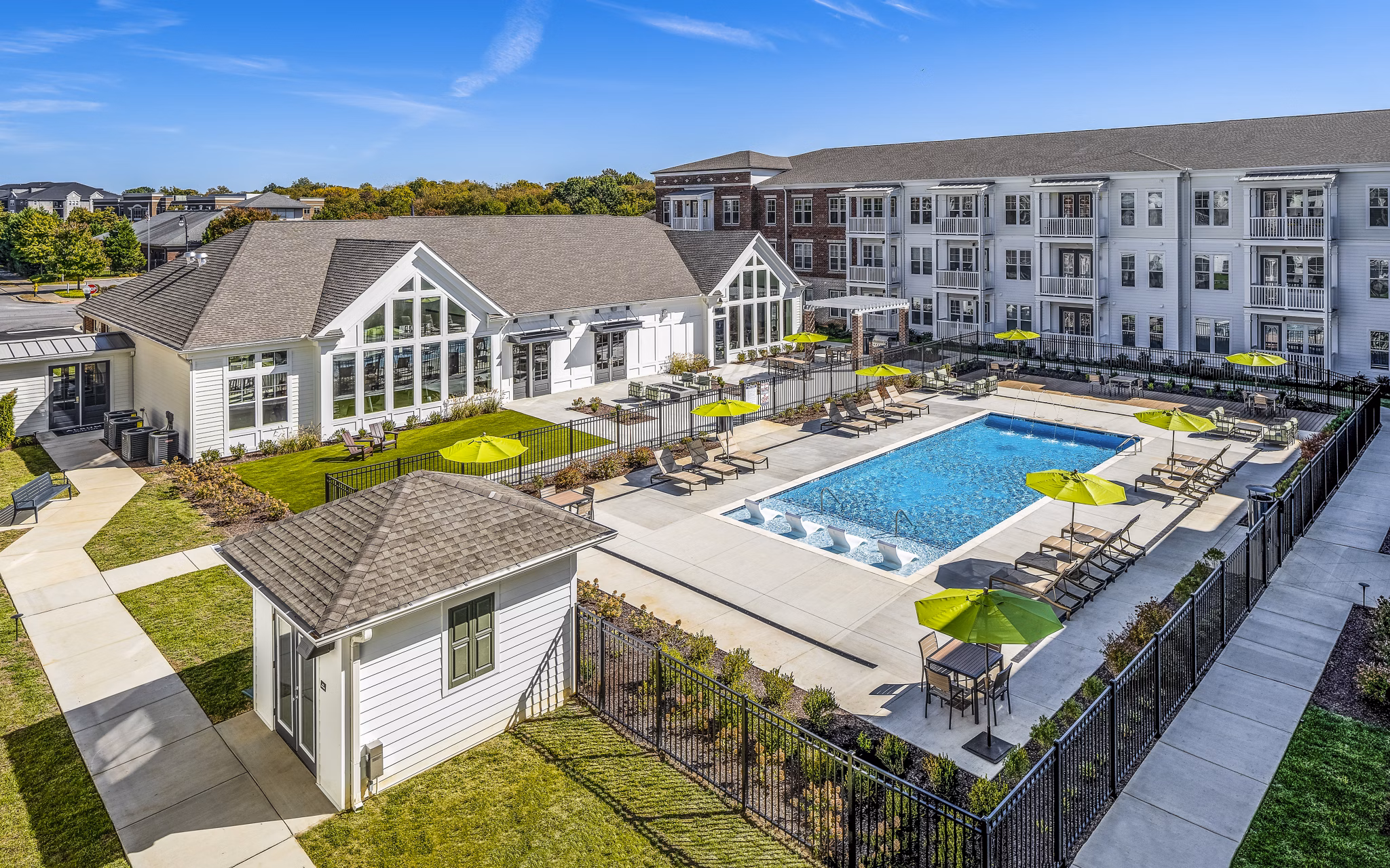 Modern poolside lounge at Album Indian Lake Apartments providing luxury relaxation for residents