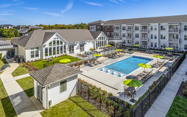 Modern poolside lounge at Album Indian Lake Apartments providing luxury relaxation for residents
