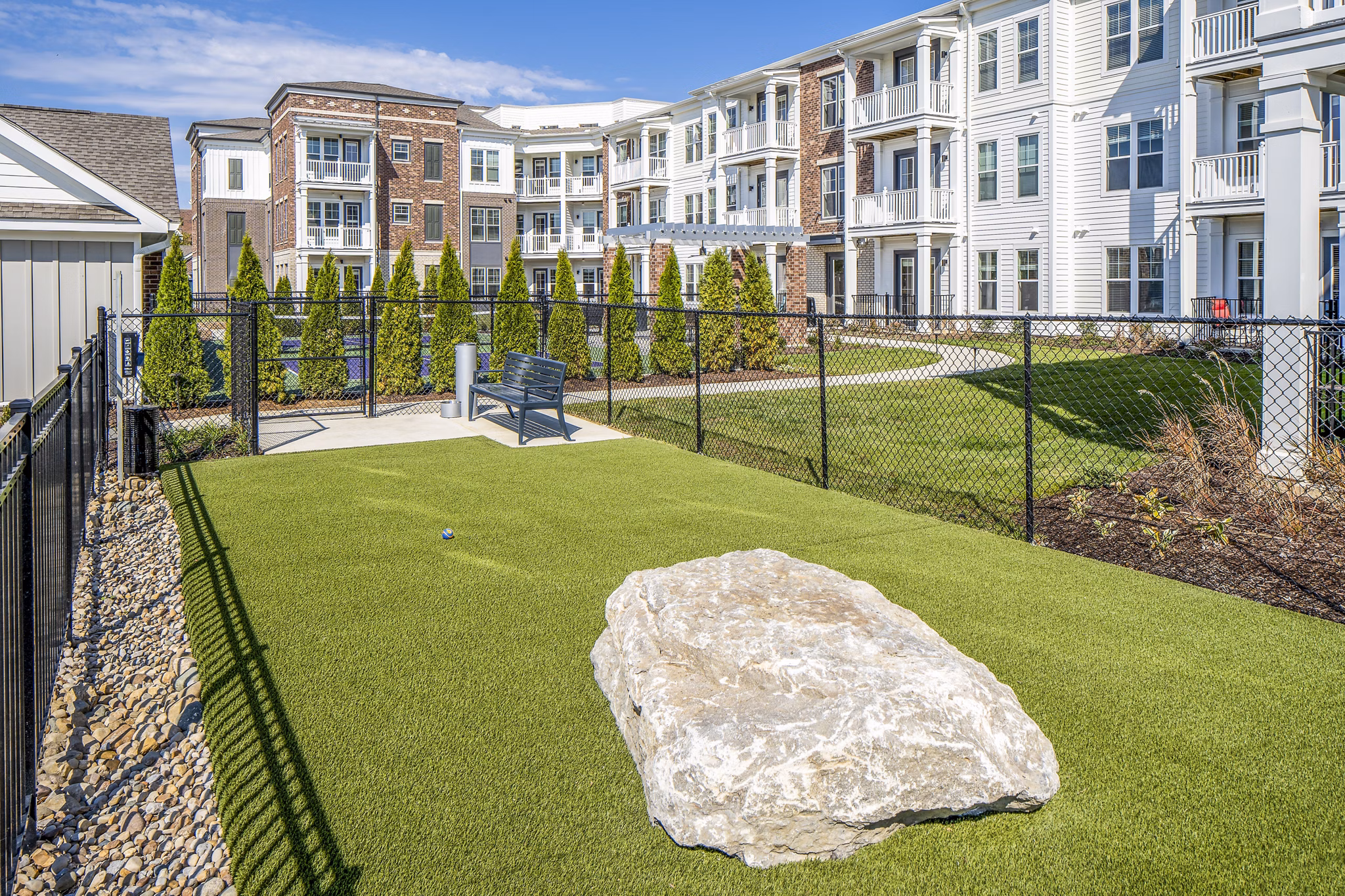 Dog park with agility equipment at Album Indian Lake Apartments