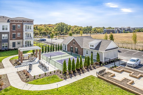 Outdoor grill area on spacious patio at Album Indian Lake Apartments