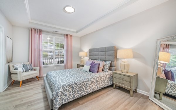 Cozy bedroom with modern furnishings at Avana Thornblade Apartments