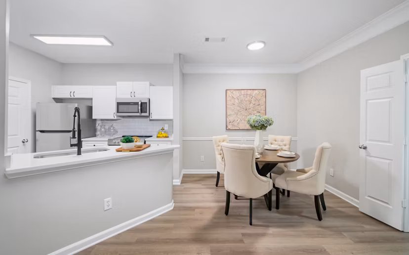Dining area with elegant furnishings at Avana Thornblade Apartments, offering a refined living experience in Greystar's luxury apartment community