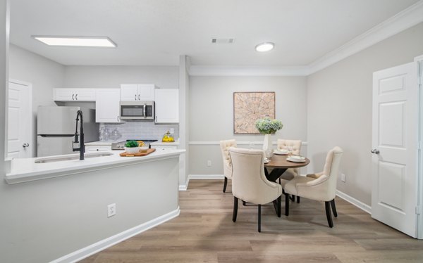 Dining area with elegant furnishings at Avana Thornblade Apartments, offering a refined living experience in Greystar's luxury apartment community