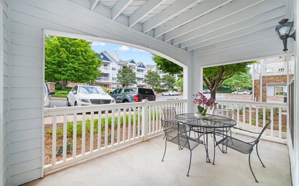 Spacious outdoor patio with modern furnishings at Avana Thornblade Apartments