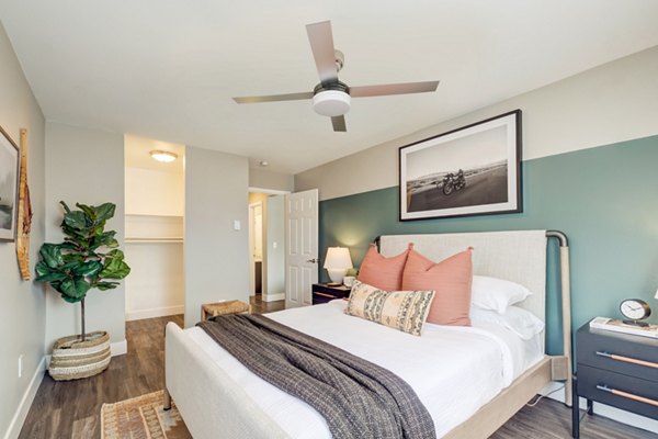 Cozy bedroom with modern decor in Habitat at Fort Collins luxury apartments