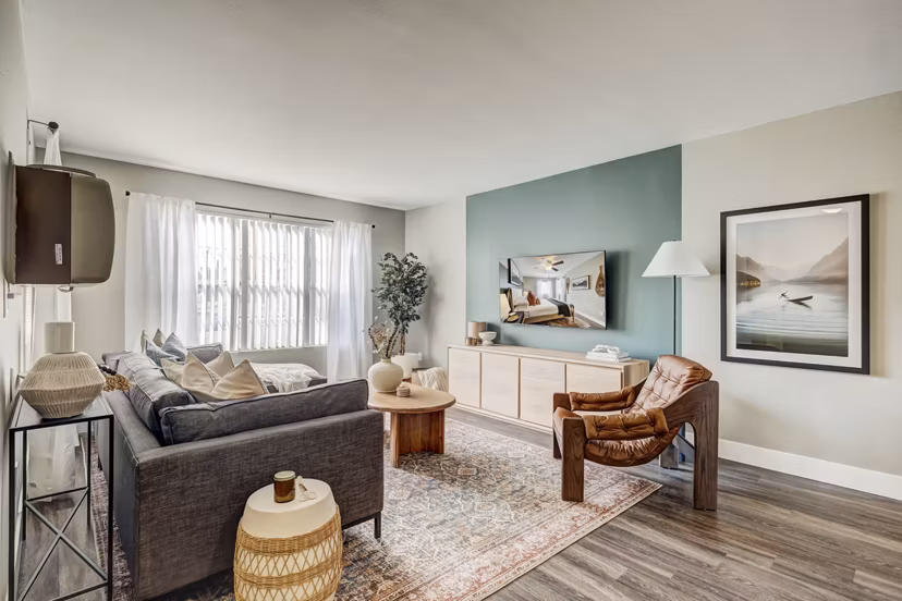 Spacious living room with modern decor in Habitat at Fort Collins luxury apartments