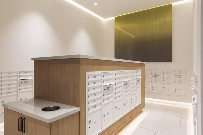 Efficient mail room with individual parcel lockers in Vert Apartments