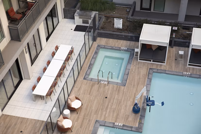 Inviting outdoor pool area at Vert Apartments