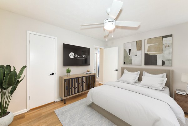 Cozy bedroom with modern decor at Avana Powers Ferry Apartments
