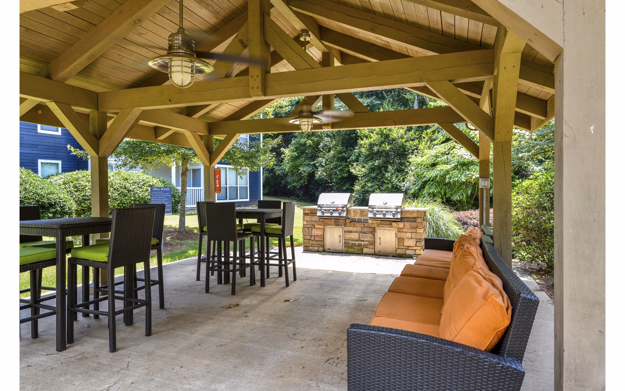Outdoor grill area with modern barbeque facilities at Avana Powers Ferry Apartments, offering a perfect spot for social gatherings