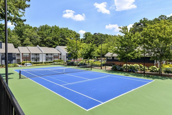 Outdoor sport court at Avana Powers Ferry Apartments ideal for basketball and tennis activities