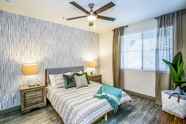 Modern bedroom with stylish decor at The Alcove Apartments, luxury living
