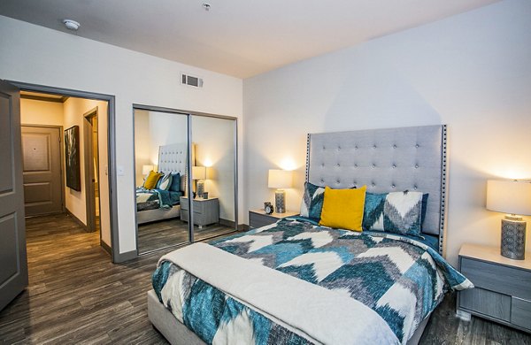 Modern bedroom with sleek design elements at The Alcove Apartments