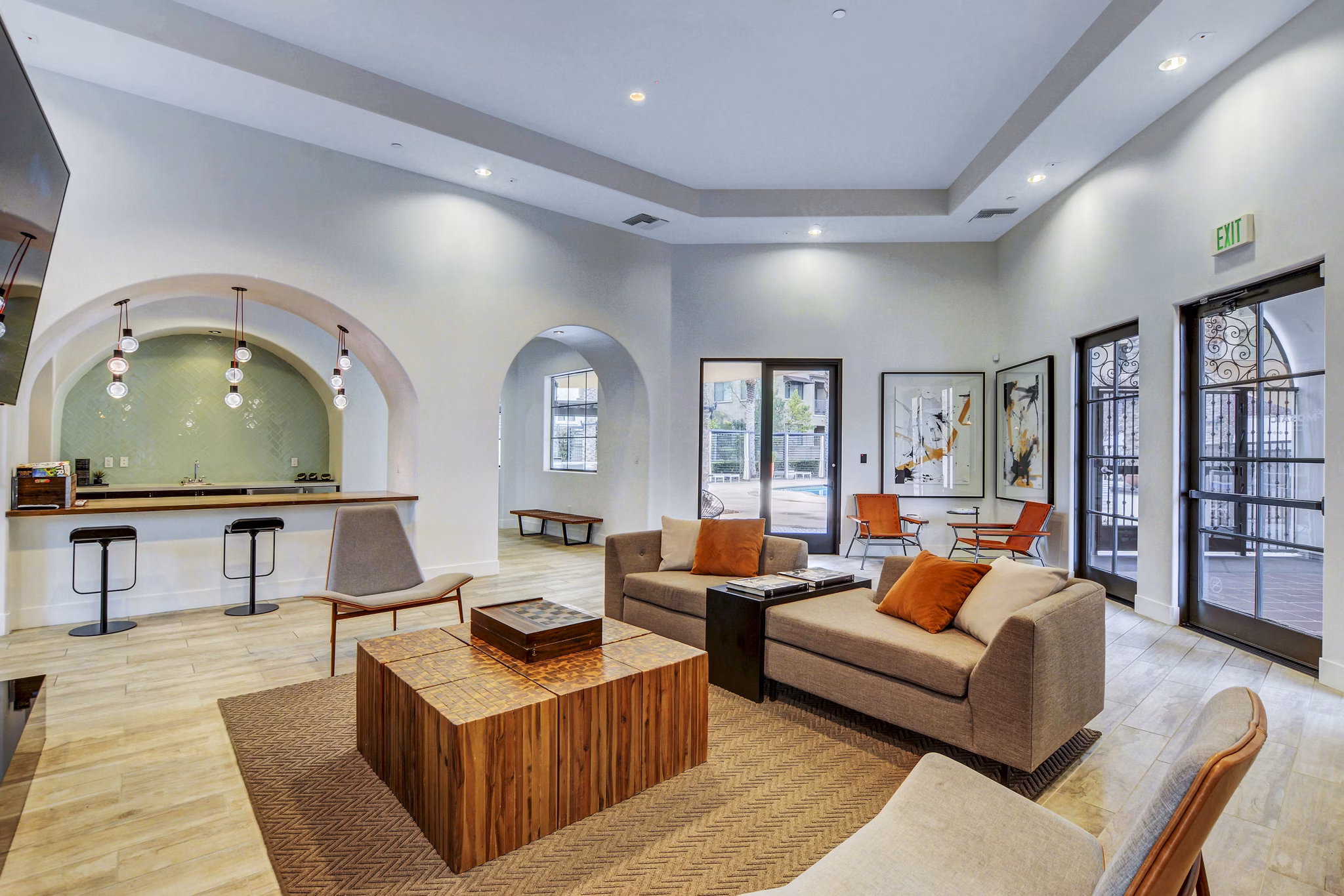 Elegant clubhouse lobby with modern decor at The Alcove Apartments