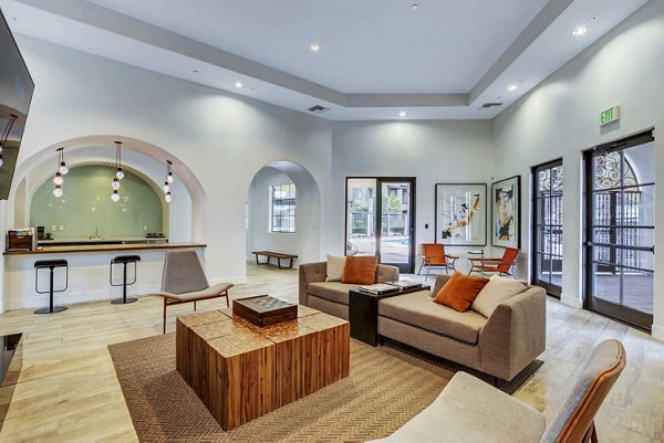 Elegant clubhouse lobby with modern decor at The Alcove Apartments