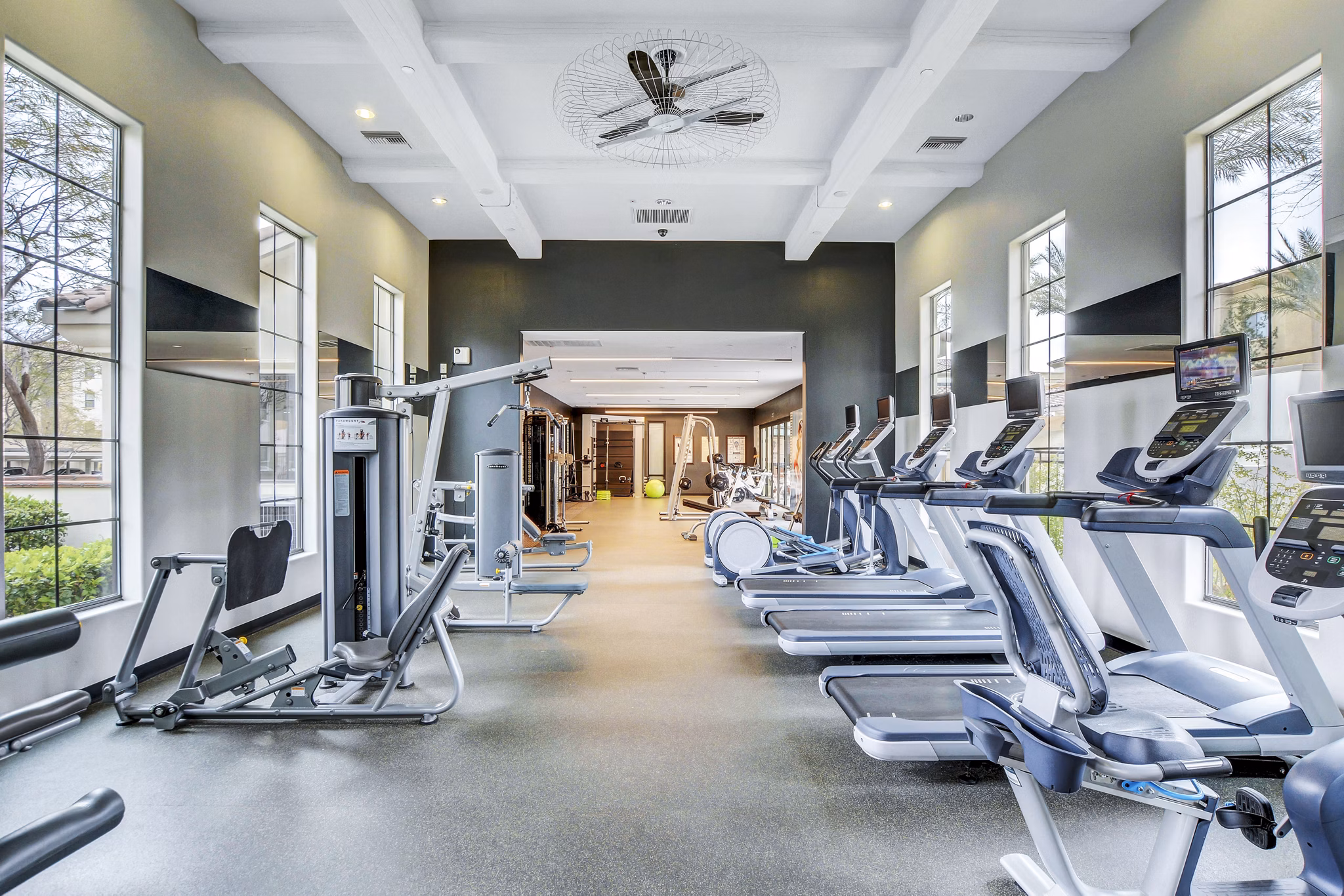 State-of-the-art fitness center with modern equipment at The Alcove Apartments, offering residents a premium workout experience